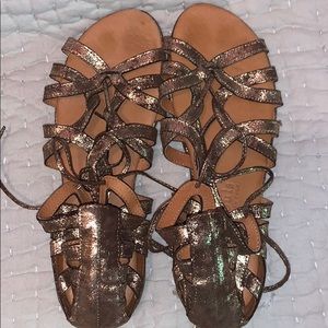 Gentle souls tie brass sandals